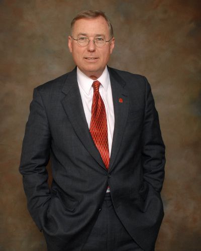 David Caveness - Presidente e CEO